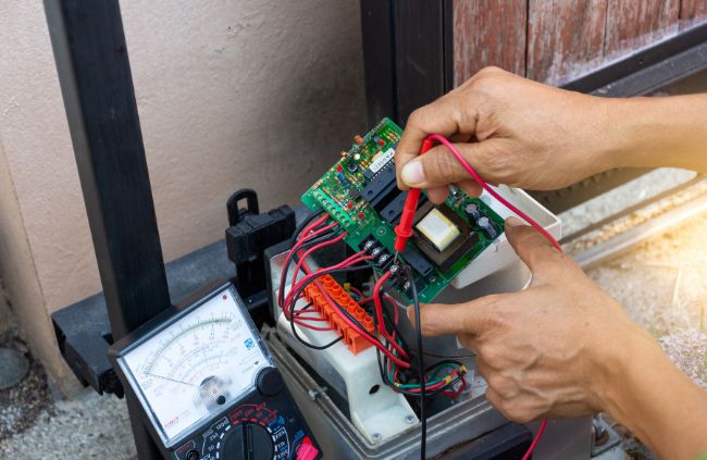 Automatic gate repairs using a multimeter on a gate control board – expert automatic gate servicing by Auto Gate Guys Gold Coast Automatic gate repairs using a multimeter on a gate control board – expert automatic gate servicing by Auto Gate Guys Gold Coast